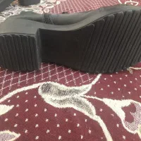 نیم پوتین|کیف، کفش، کمربند|شیراز, تندگویان|دیوار