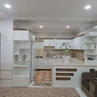 معاوضه منزل مسکونی سه طبقه در بانه با خانه در سقز