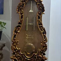 ساعت ایستاده و آینه کنسول
