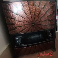 بخاری و میز زیر تلویزیونی و زیر اتو