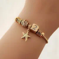 گوشواره و النگو چفتی ژوپینگ با ابکاری طلا