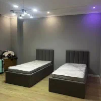 تخت خواب وصندلی