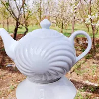 قوری چینی سفید طرح خورشیدی