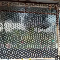 درب مغازه زنبوری