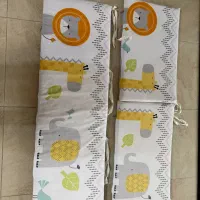 محافظ تخت نوزاد و عروسک های موزیکال