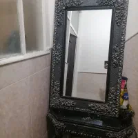 اینه  شمعدان