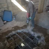 تخریب.تراشیدن گچ.سرامیک.اجرنما.موزاییک کف حیاط