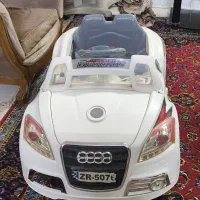 ماشین دوموتوره شارژی کودک و سرسره