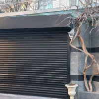کرکره برقی،جک بازوئی، نمای کامپوزیت و سایه بان برق
