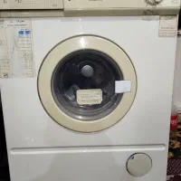 لباسشویی ارج|ماشین لباسشویی و خشک‌کن لباس|قم, قلعه یزدیها|دیوار