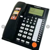 تلفن رومیزی وساعت دیواری