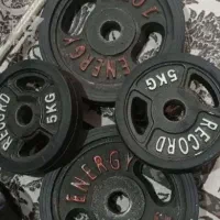 تعدادی وزنه های دمبل هالتر