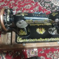 چرخ خیاطی مرد پرنده دستی با دوخت