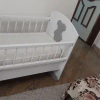 تخت کنار مادر