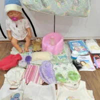 عروسک شیرخوار بی بی بورن با تمامی وسایل کامل،ساک