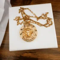 زنجیر پلاک ورساچه طلا 9گرم نیم 150بالا خام