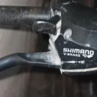 ساعت مچی‌نونوکارکرده مربوط به‌عکس‌ دسته دنده