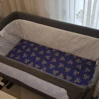 تخت کنار مادر کودک