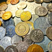 سکه خارجی (gj) و سکه ۱۰ ریال مصدقی (gd)