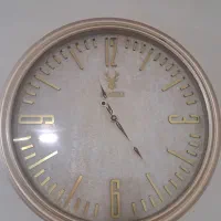 ساعت دیواری و تابلو چراغدار