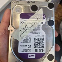 دو عدد هارد hdd بنفش ۴ ترا ۱ ترا آبی
