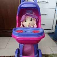 عروسک داخل کالسکه