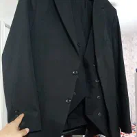 یک عدد کت و شلوار مردانه مشکی سایز 48
