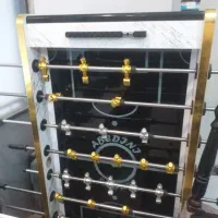 یک عدد فوتبال دستی بزرگ چرخ دار