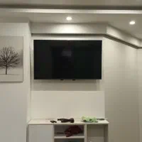 برقکار برقکشی نصاب لوستر قفسه پایه تلویزیون براکت