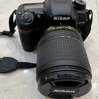 دوربین نیکون D7500 با لنز ۱۴۰-۱۸ و فلاش اکسترنال