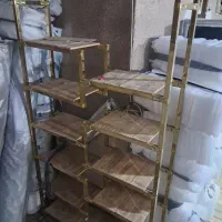 دکور مغازه تمام استیل طلایی