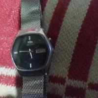یک ساعت اورینت درحد نو استیل ضد زنگ اتومات