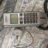 تلفن رومیزی ودیواری