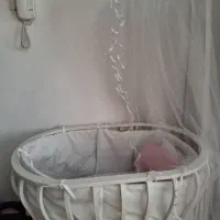 گهواره سفید نونو سالم پشه بند هم داره