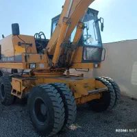 بیل مکانیکی HE100