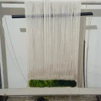 کارگاه دار قالی چله کشیده و تابلو فرش