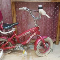 ماشین شارژی و دوچرخه