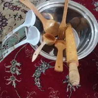 لوازم آشپزی ملاقه چوبی و استیل و دو عدد ابکش