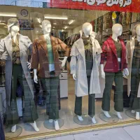 فروشنده خانم و آقا فروشگاه پوشاک