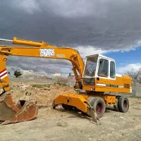 خاکبرداری بیل مکانیکی کمپرسی