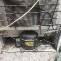 موتور یخچال سلام  روی یخچال