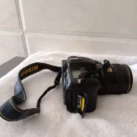 دوربین عکاسی 7100نیکون بالنز 18/140و24/70