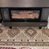 بخاری شومینه ای نیک کالا در حد نو