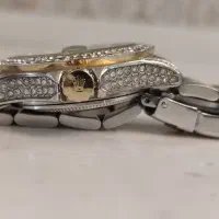 ساعت رولکس|ساعت|رباط‌کریم, رباط‌کریم|دیوار