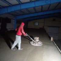 بتن ریزی با ماله پروانه وتراز لیزری