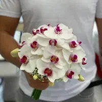 گلفروشی گلاریس دسته گل عروس باگل ارکیده توسرخ جذاب