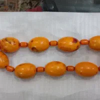 تسبیح بزرگ موروی زردوی عقیق خام هرگرم ۷۰هزارتومان
