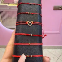 دستبند رِد استرینگ با گوی البرنادو طلا