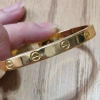 طلای ۱۸ عیار نو دستبند کارتیر و انگشتر برند