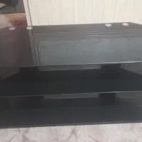 زیر تلویزیونی شیشه ای